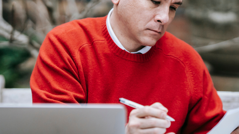 Guy Reviewing Technology